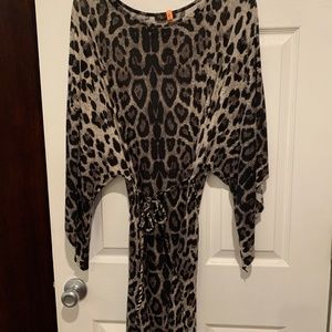 Black/grey leopard print dress. Bat wing sleeves, belted, knee length.